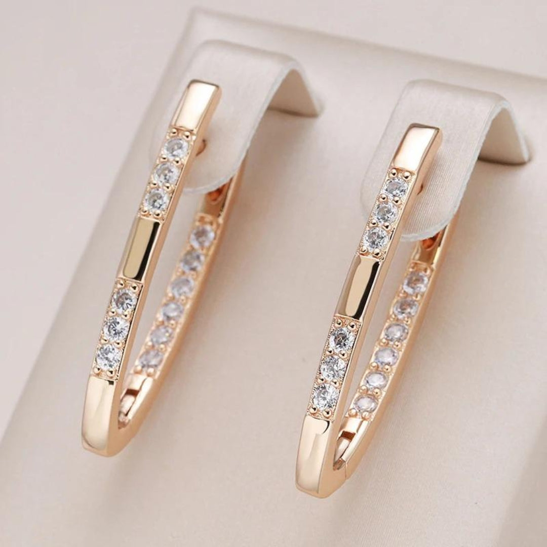 Brincos elegantes em ouro com zircónio