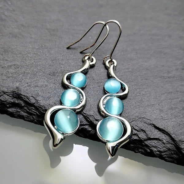 Brincos pendentes de cristal azul