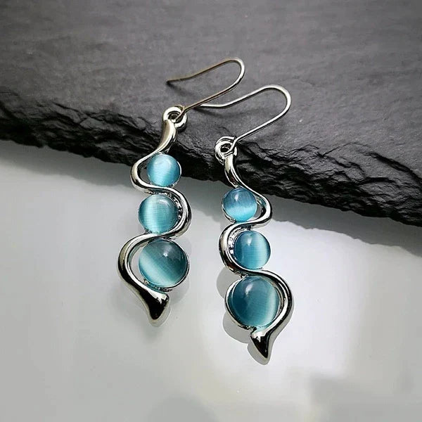 Brincos pendentes de cristal azul