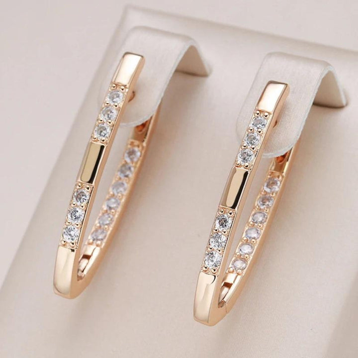 Brincos elegantes em ouro com zircónio