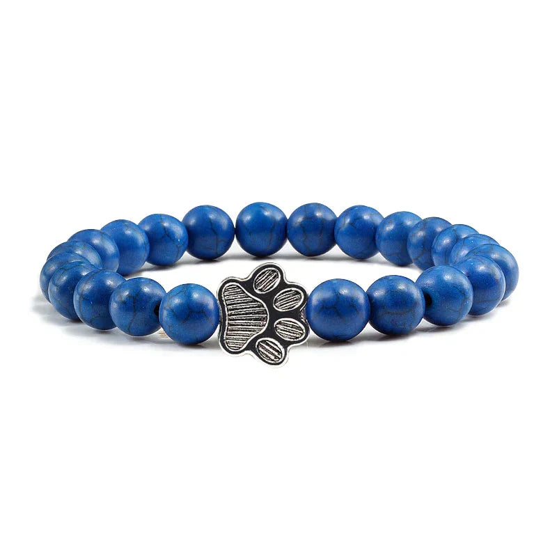 Bracelete com patas decoradas com pérolas
