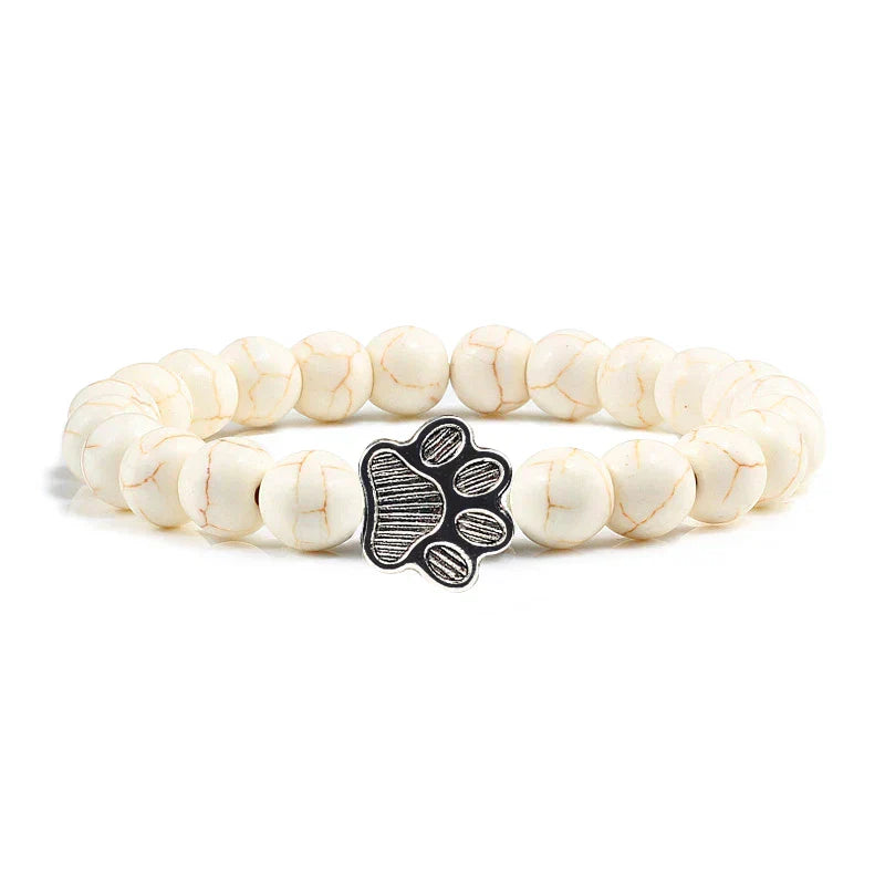 Bracelete com patas decoradas com pérolas
