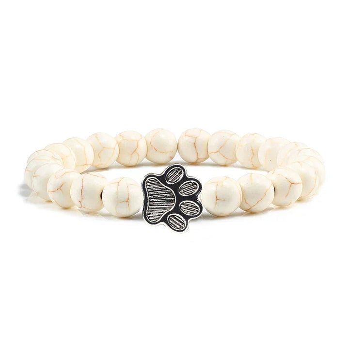 Bracelete com patas decoradas com pérolas