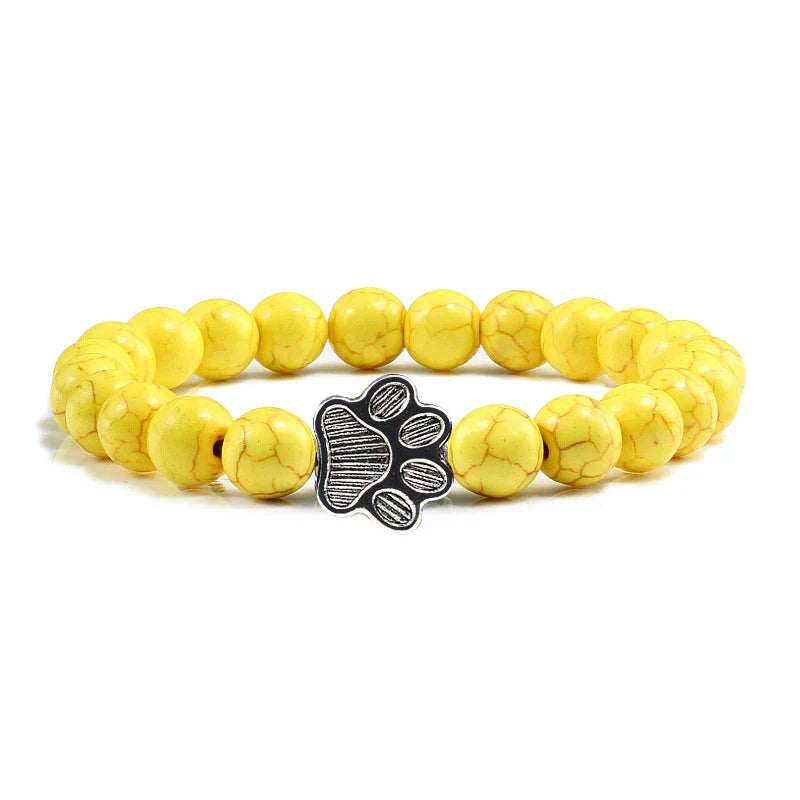 Bracelete com patas decoradas com pérolas