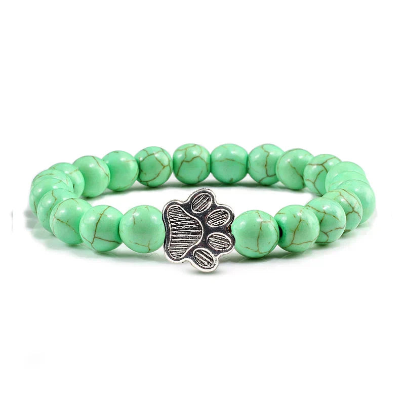 Bracelete com patas decoradas com pérolas