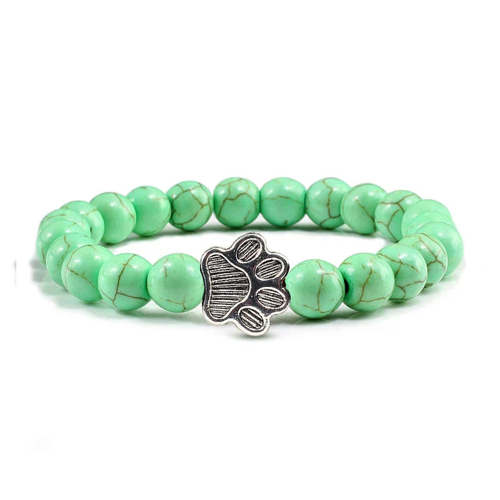 Bracelete com patas decoradas com pérolas