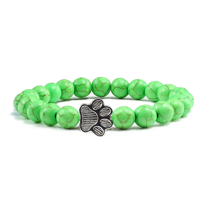 Bracelete com patas decoradas com pérolas