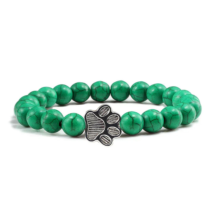 Bracelete com patas decoradas com pérolas