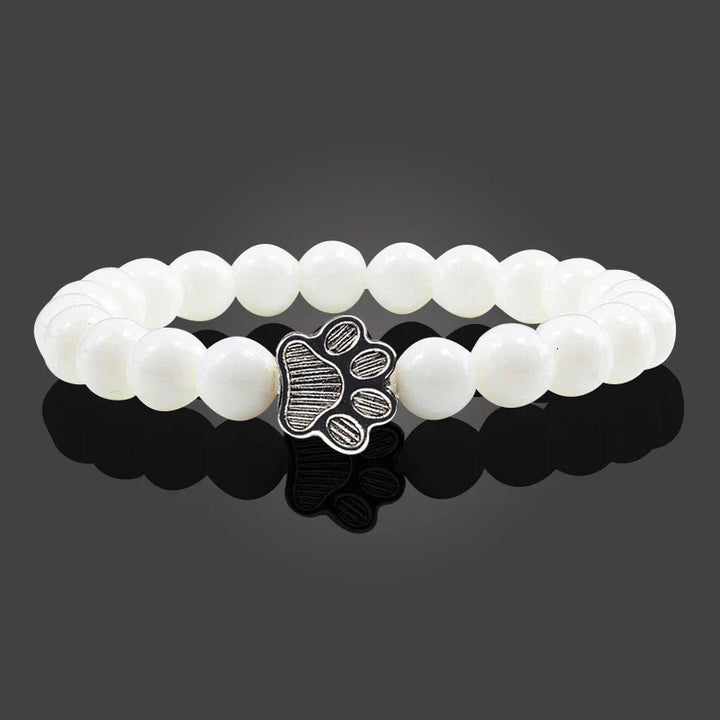Bracelete com patas decoradas com pérolas