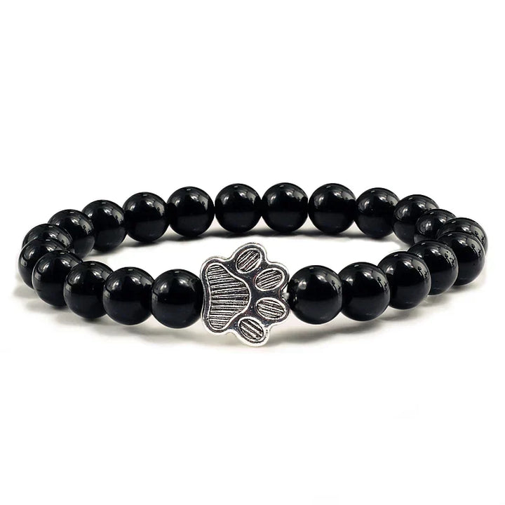 Bracelete com patas decoradas com pérolas