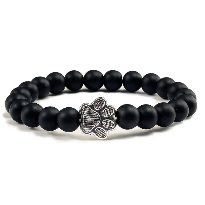 Bracelete com patas decoradas com pérolas