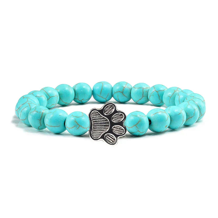 Bracelete com patas decoradas com pérolas