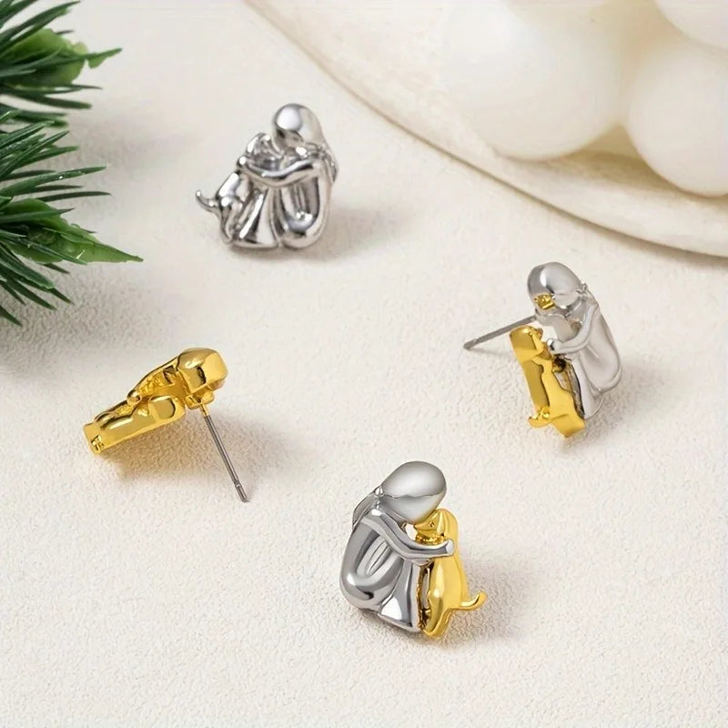 Brincos Hug bicolores em prata e ouro