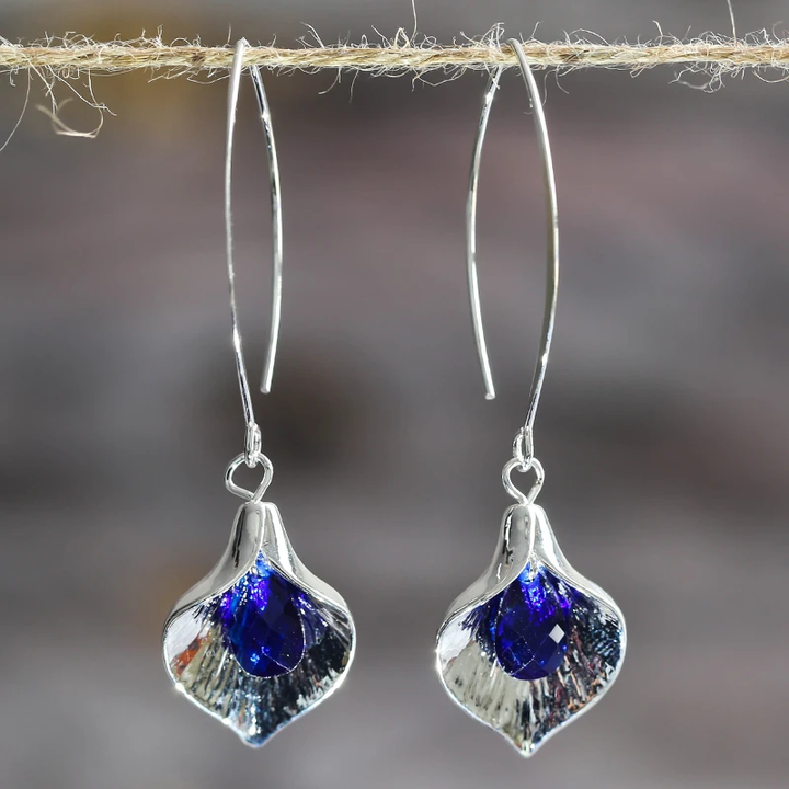 Brincos de prata com pedra azul