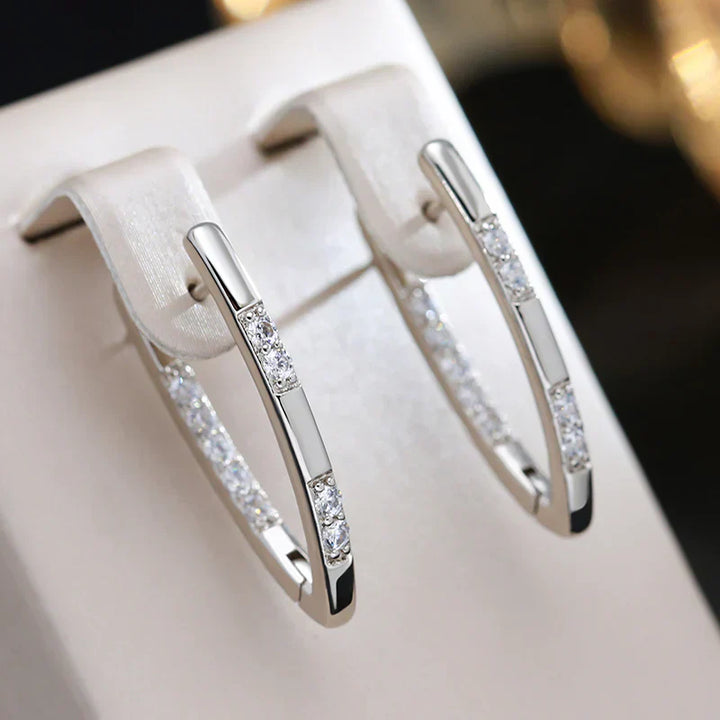 Brincos elegantes em ouro com zircónio